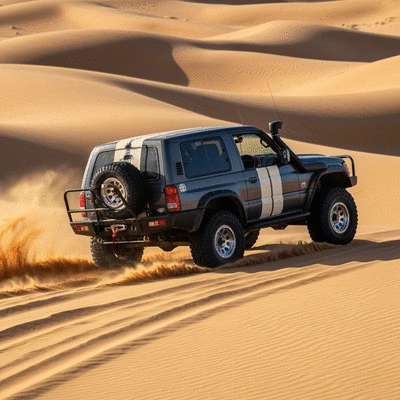 Off-road vehicle navigating sandy dunes